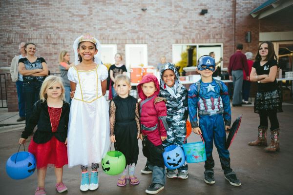 A group of children enjoying a Halloween-time event