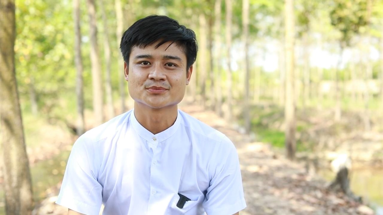 World Vision Myanmar staff member in white polo shirt